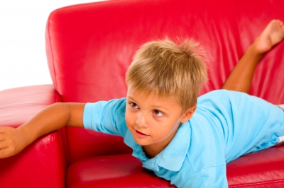 Buy a kid-proof sofa.  Seriously, just do it.
