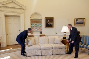 President Obama demonstrates how to move a couch